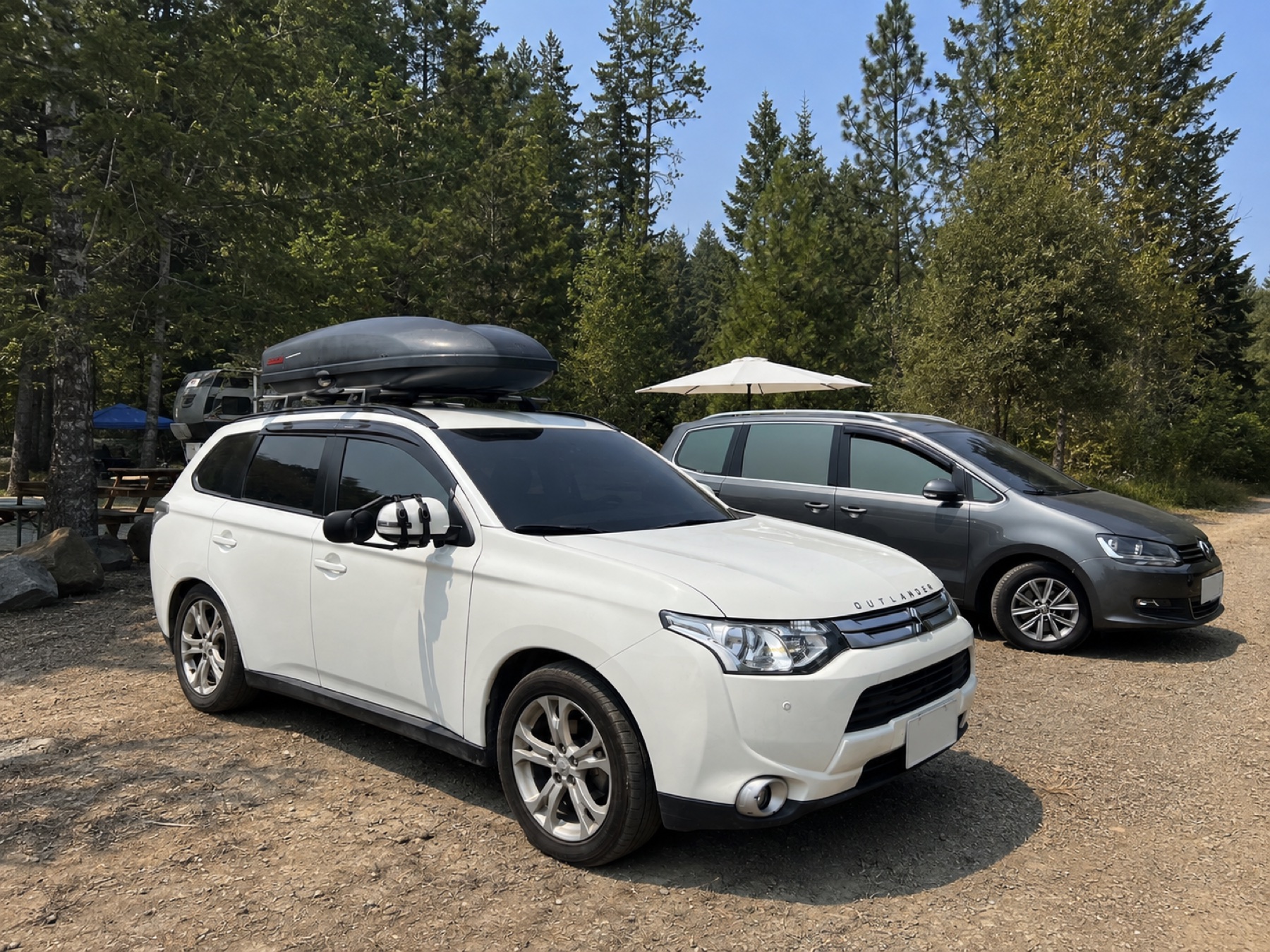 MirroGuard towing mirror fitted to an SUV at a campground